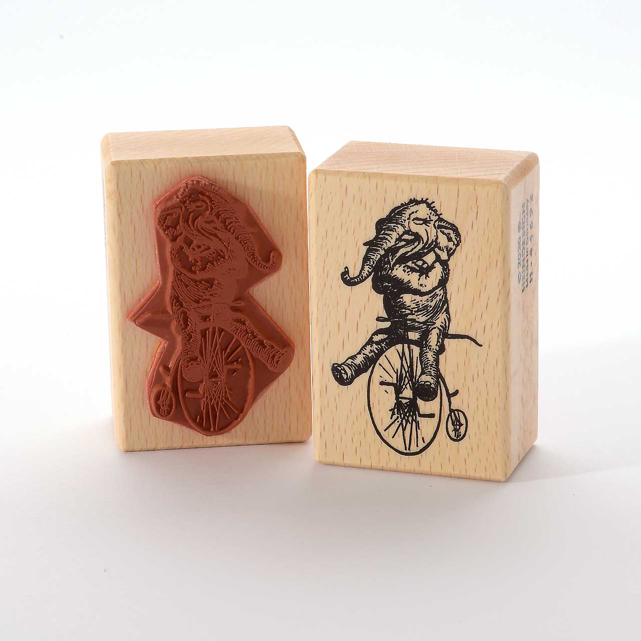 Motivstempel Titel: Elefant auf dem Fahrrad