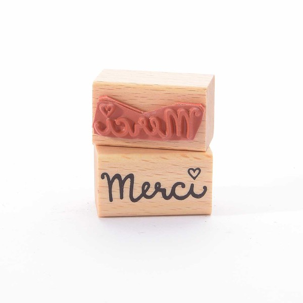 Motivstempel Titel: Merci